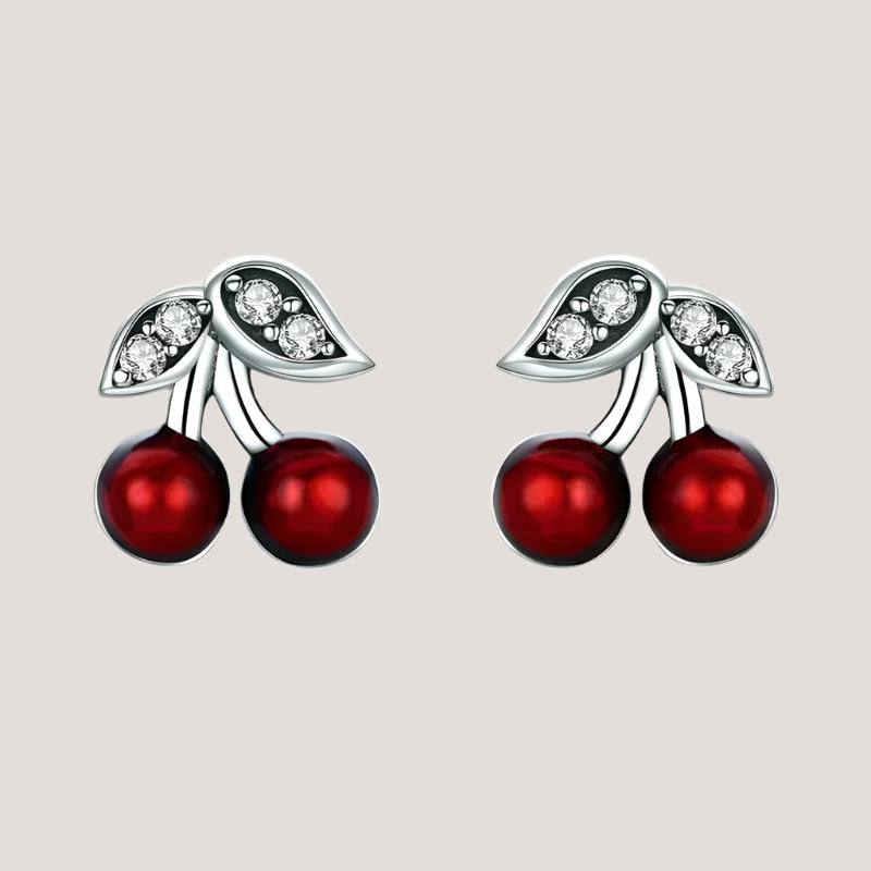 Cherry-themed silver earrings with red gemstones on a white background, featuring '925 Sterling Silver' stamp.