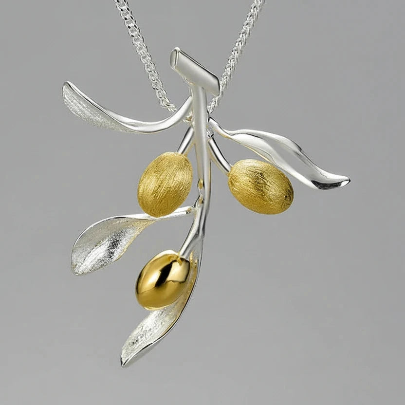 Silver and gold pendant necklace with 'Lotus Fun' branding on a gray background