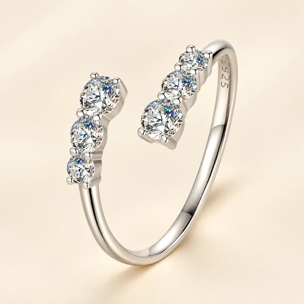 Silver ring with multiple diamonds on a cream background