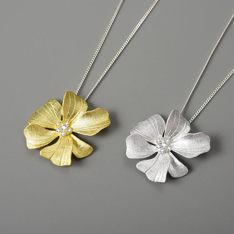 Luxury floral jewelry pendant necklace for women with sparkling zircon crystals and 18K gold plated flower design on a 925 sterling silver chain